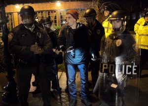 A journalist is arrested outside the Ferguson Police Department on Saturday. (Photo: Alex Wroblewski via Twitter)