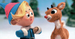 A picture showing an elf and a reindeer as captured in a Christmas television show.
