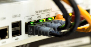 A stock image of an Internet server with Ethernet cables