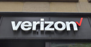 A Verizon sign in front of a store in Chicago.