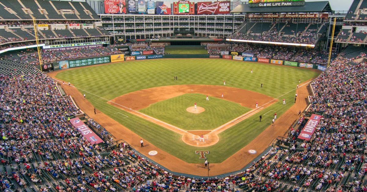 A baseball stadium. (Stock image via Pexels, Graphic by The Desk)