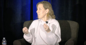Former YouTube CEO Susan Wojcicki appears at an event. (Still frame via Susan Wojcicki/YouTube, Graphic by The Desk)