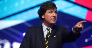 Fox News personality Tucker Carlson appears at an event in Phoenix, Arizona on December 18, 2021. (Photo by Gage Skidmore via Flickr Creative Commons)