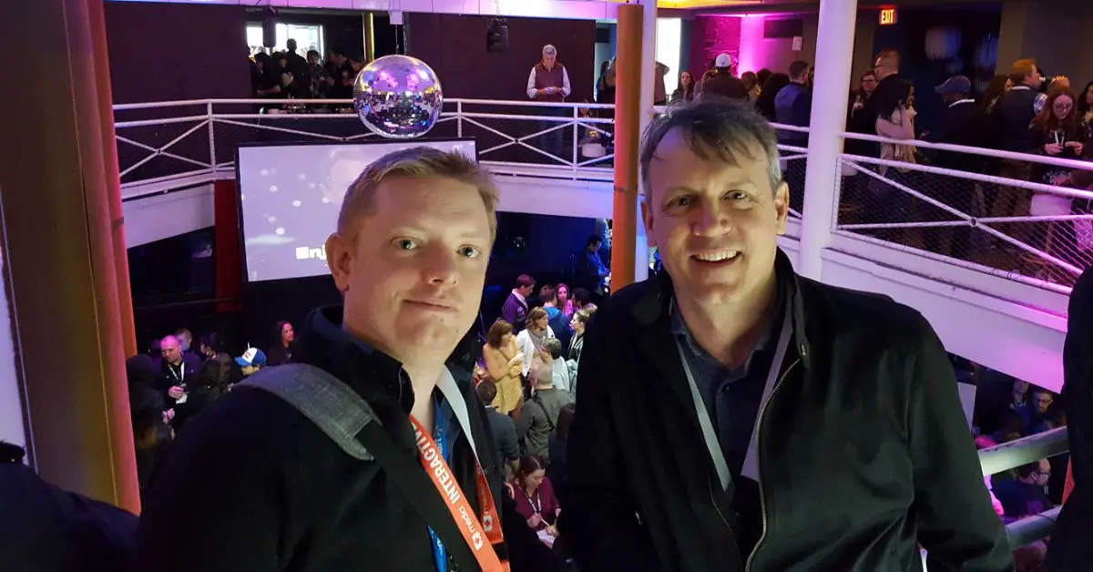 Wired journalist Dell Cameron (left) poses with filmmaker Brian Knappenberger at an event in 2017. (Photo by Dell Cameron via Facebook)