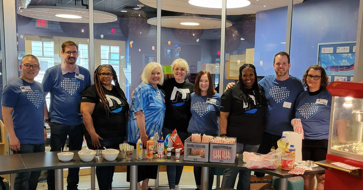 DirecTV employees participate in the company's annual "DirecTV Day" community outreach event. (Courtesy photo)