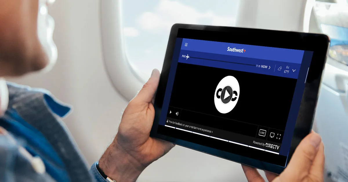 A passenger uses a tablet to watch a live feed of ABC, powered by DirecTV, on a Southwest flight. (Courtesy image)