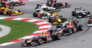 The opening lap of the 2010 Malaysian Grand Prix Formula 1 race. (Photo via Wikimedia Commons)