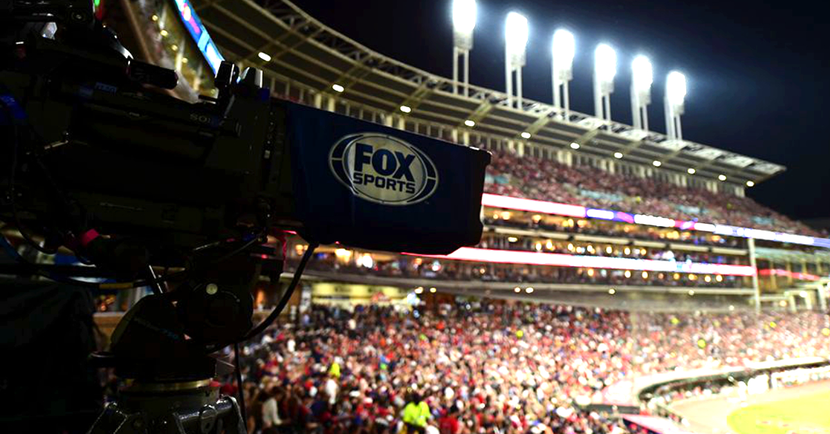 A camera bearing the Fox Sports logo films a baseball game. (Courtesy image)