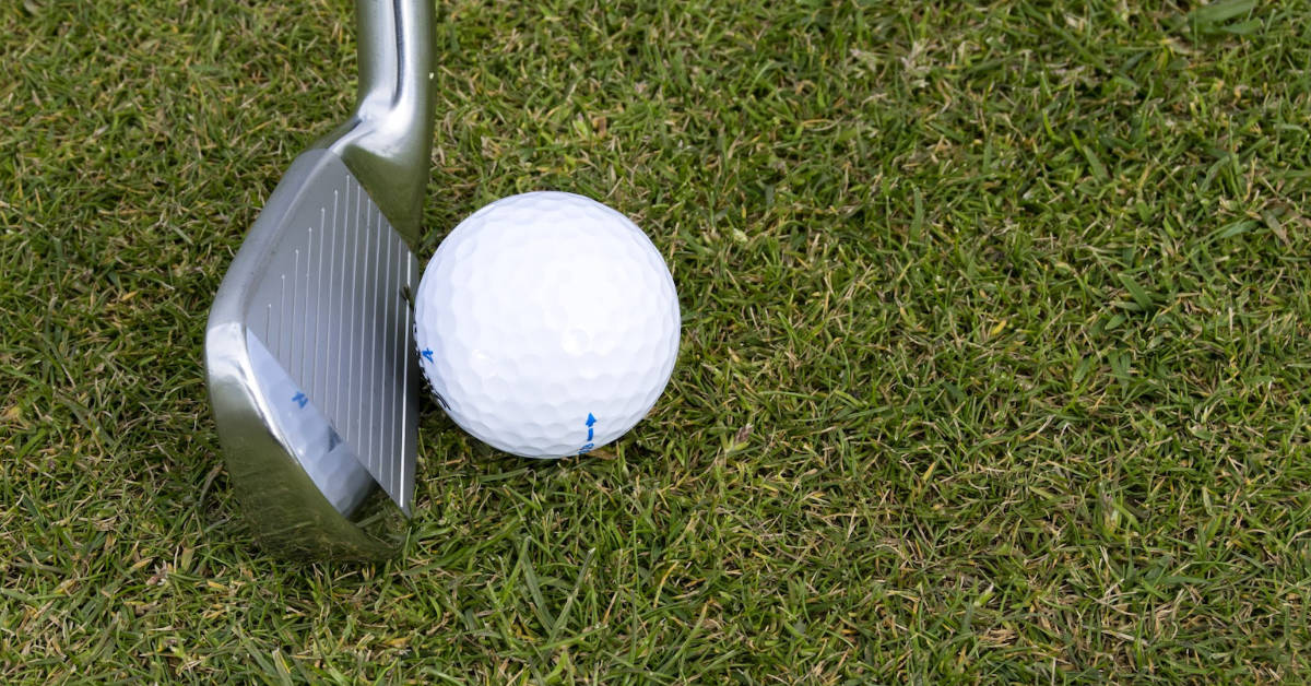 A golf club and ball. (Stock image)