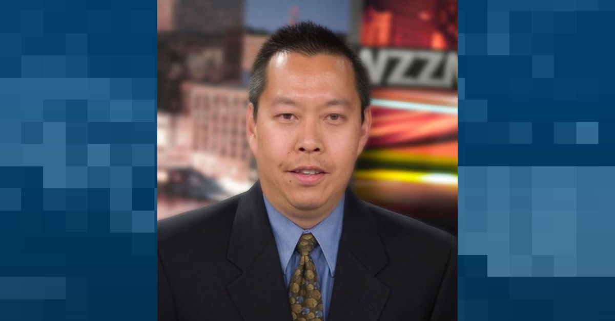 Television executive Stanton Tang appears in a biographical photo for WZZM-TV in Grand Rapids, Michigan. (Handout photo)