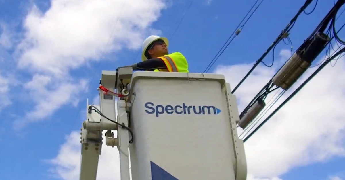 A maintenance worker with Charter's Spectrum works on a utility line. (Courtesy photo)