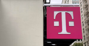 A T-Mobile sign in front of a retail store in downtown Portland, Oregon. (Photo by Matthew Keys for The Desk)