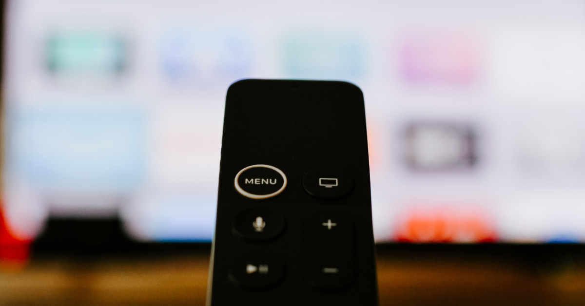 An Apple TV remote control. (Photo by Kelly Sikkema via Unsplash)