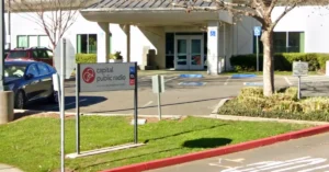 A sign outside the radio studios of CapRadio on the campus of CSU Sacramento. (Photo via Google Street View)