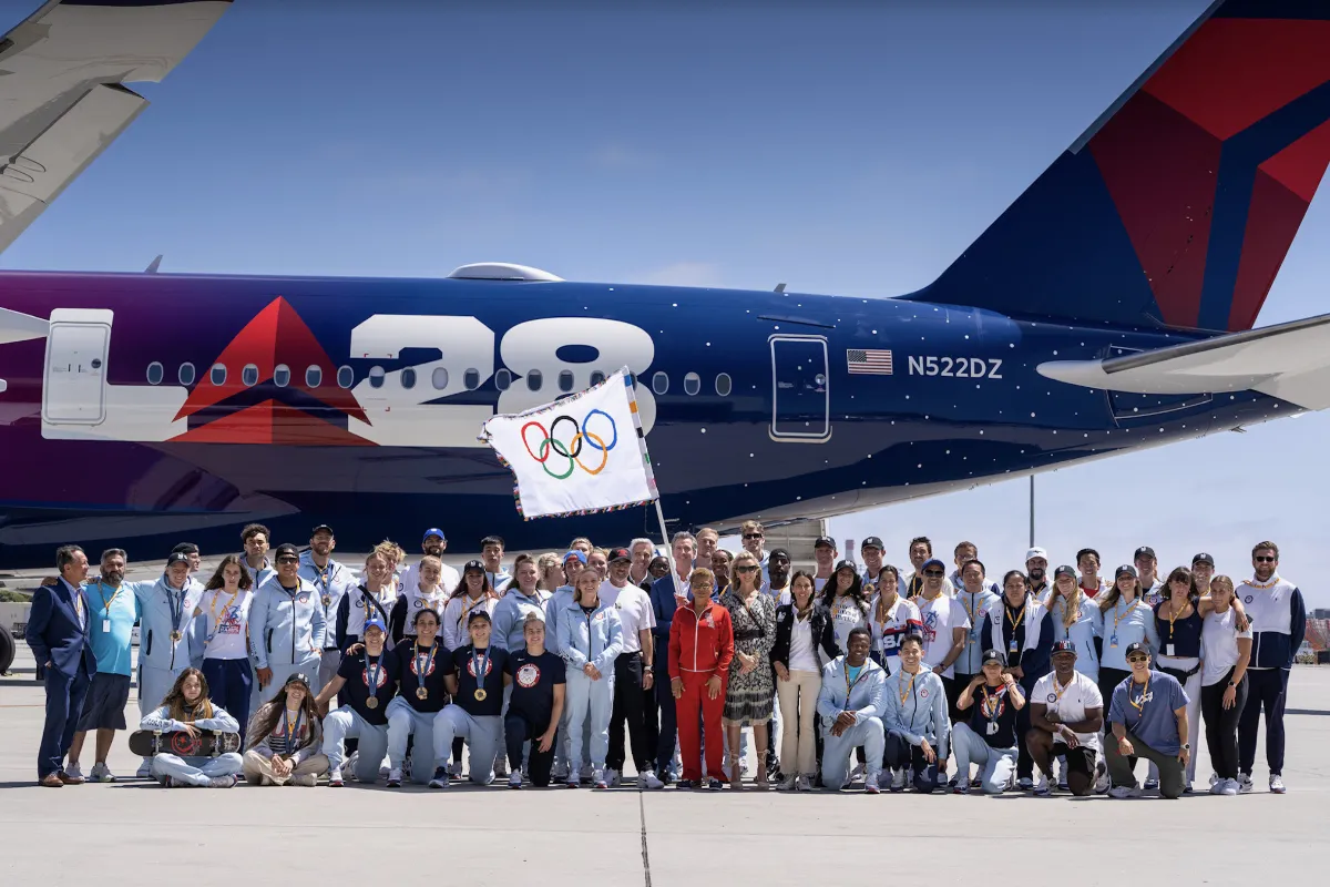 California Governor Gavin Newsom, Los Angeles Mayor Karen Bass and other dignitaries assemble with athletes from the 2024 Summer Olympic Games and Paralympic Games to welcome the Olympic Flag to Los Angeles International Airport on Monday, August 12, 2024. (Courtesy photo)