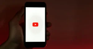 YouTube logo on a smartphone.