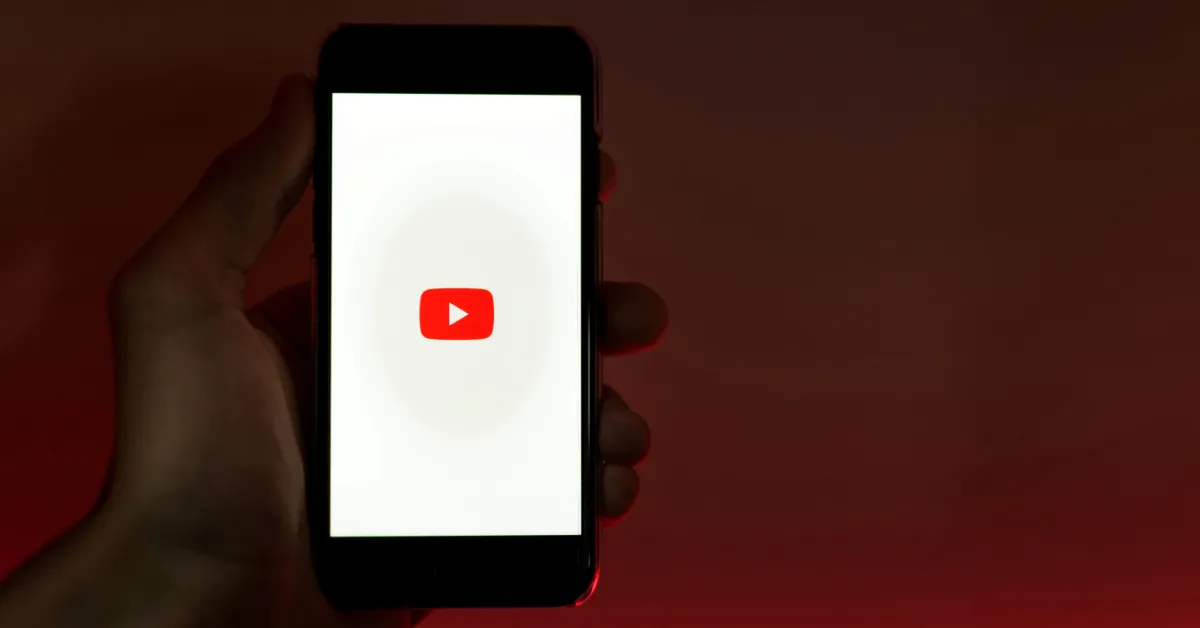 YouTube logo on a smartphone.