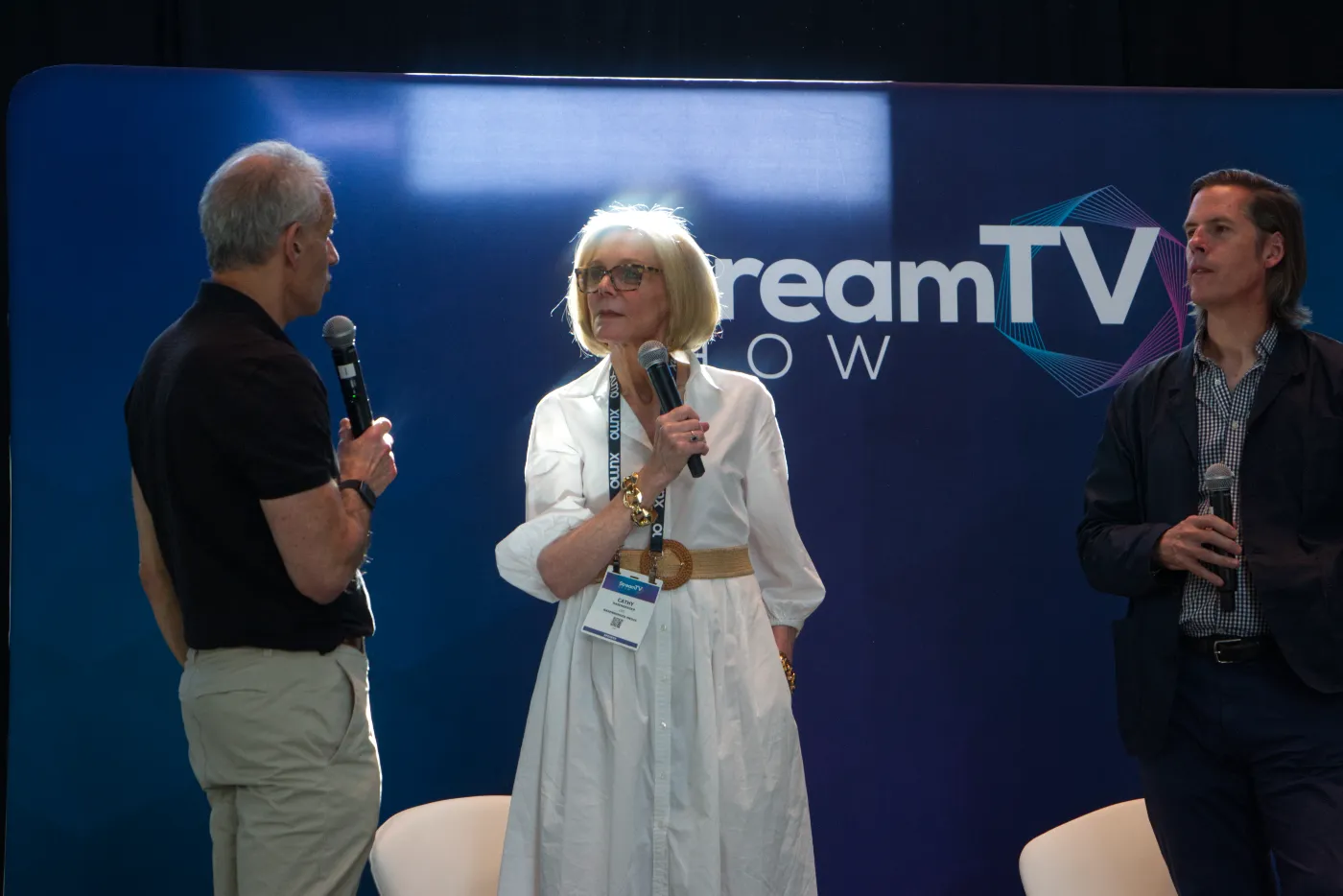 From left: TVREV's Alan Wolk, Cathy Rasenberger and Dade Hayes participate in an improvised discussion about Fox's proposed acquisition of Roku at the StreamTV Show TVREV Summit. (Photo by Matthew Keys for The Desk)