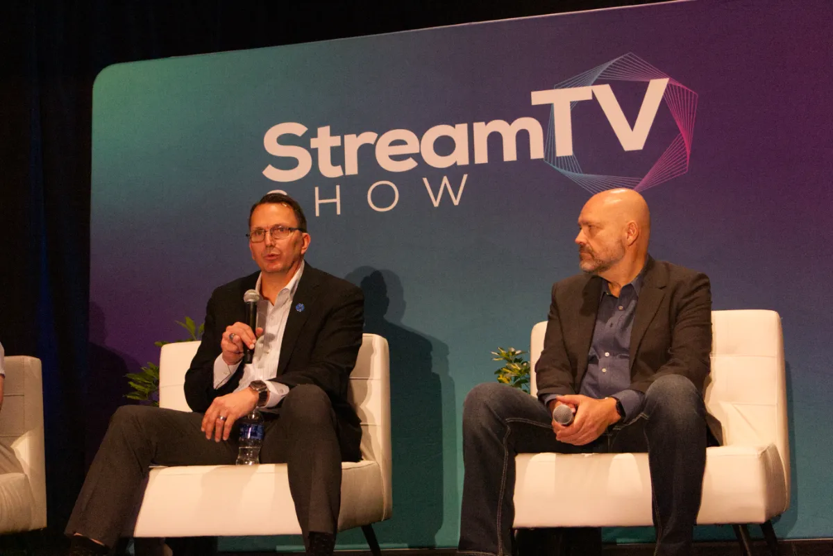 STORY ONLY Mike Wittrock Jim Hallers WEBP TD From left: DIRECTV's Chief Operating Officer Mike Wittrock and Founder of Tailgators Pub & Grill Jim Hallers participate in a panel discussion at the StreamTV Show. (Photo by Matthew Keys for The Desk)
