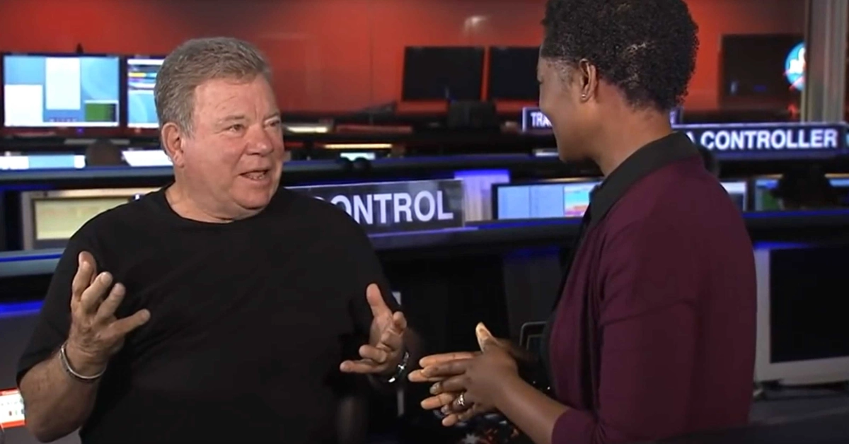 BLANK William Shatner NASA Photo WEBp TD Actor William Shatner helps choose the winner of a contest where a message would be carried into interstellar flight by the Voyager team assigned by the Deep Space Network (DSN) at NASA's Jet Propulsion Laboratory. (NASA photograph)