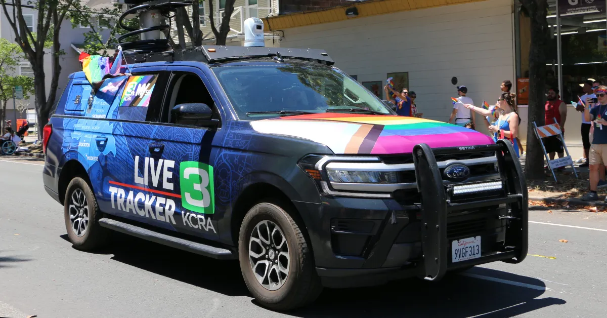 A news vehicle used by Hearst-owned KCRA-TV participates in the Sacramento Gay Pride Parade in June 2026. (Photo by Matthew Keys for The Desk)