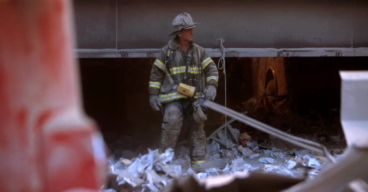 A firefighter stands amid the rubble of the World Trade Center's two towers on September 11, 2001. (Photo courtesy Library of Congress/public domain)